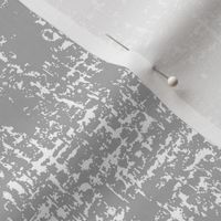Gray and white textured and tonal wallpaper and fabric