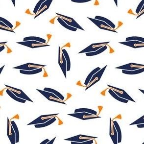 Navy blue graduation caps with orange tassels