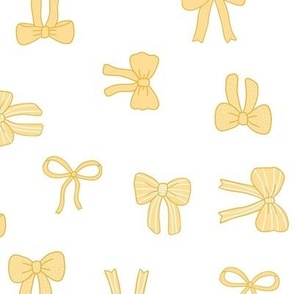 Girly Bows yellow on white tossed multi-directional
