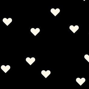 (L) Cream hearts on black background pattern