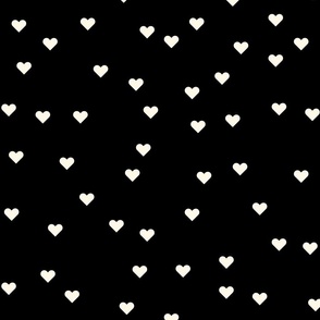 (M) Cream hearts on black background pattern