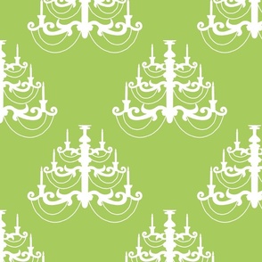 White chandelier on a green background