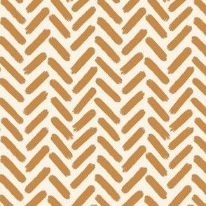 Painted tractor tracks – painted chevron herringbone in caramel yellow