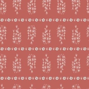 Vintage seagrass in vertical lines - white on redwood red background