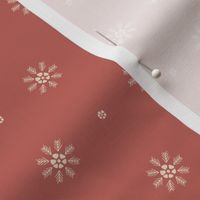 Sea flowers polka dots in white on redwood red background