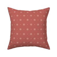 Sea flowers polka dots in white on redwood red background