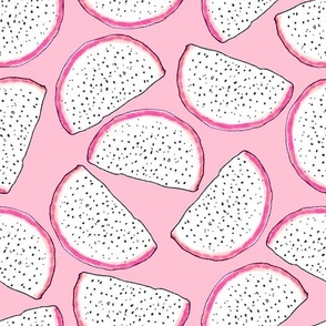 Dragonfruit slices on a light pink background