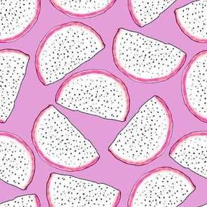 Dragonfruit slices on a lilac background