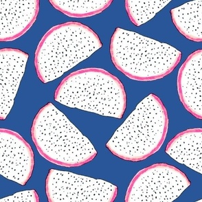 Dragonfruit slices on a blue background