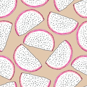 Dragonfruit slices on a beige background