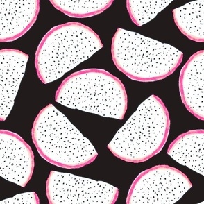 Dragonfruit slices on a black background