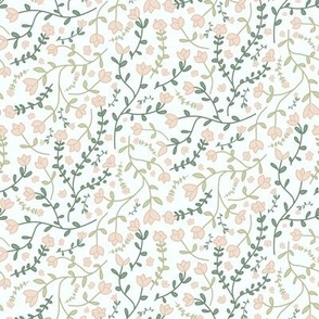Ditsy floral tossed light pink flowers and green leaves on a light blue background Medium