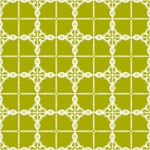 Fanciful tile block in green and white. Extra small scale