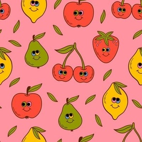 funny fruits and berries on a pink background