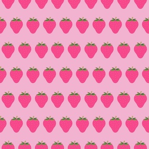 Cerise pink strawberries on pink background