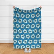 Retro-beige-white-geometric-sun-with-darky-gray-cat-face-on-vintage-medium-blue-XL-jumbo