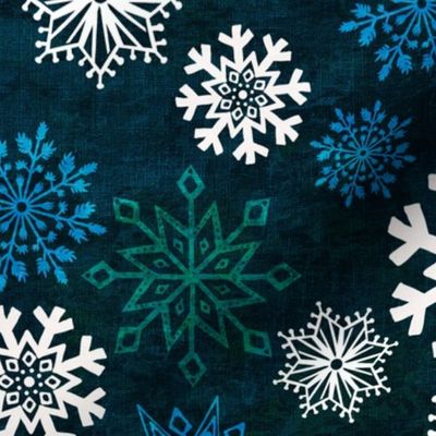12” repeat Hand drawn frozen snowflakes on textures background with woven texture overly white, green, blue on deepest blue