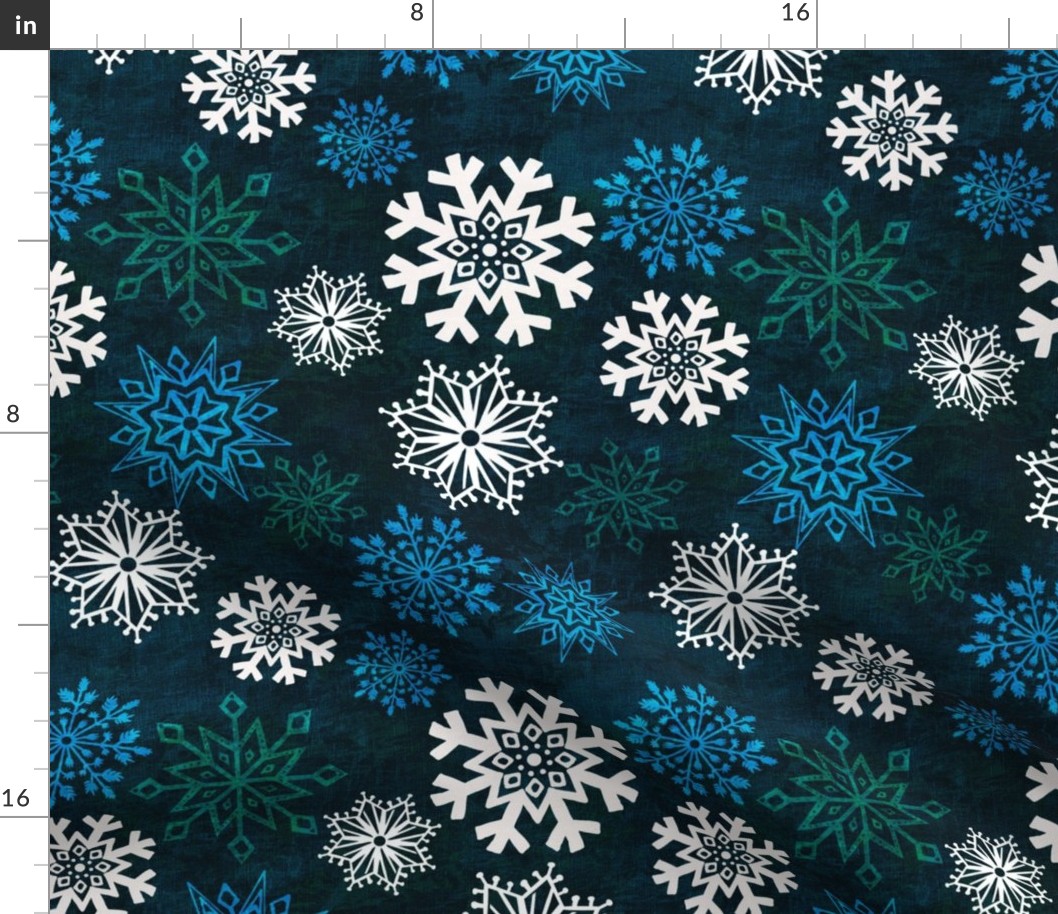 12” repeat Hand drawn frozen snowflakes on textures background with woven texture overly white, green, blue on deepest blue