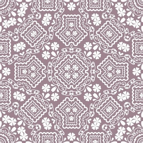 white ornament on a beige background