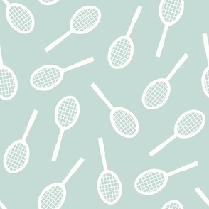 Sports Court Blender: White Badminton  Racquets on a Dusty Blue Background
