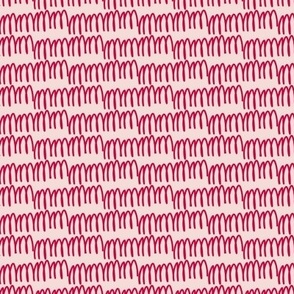 quirky red design on pink background