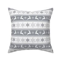 Winter Scandinavian pattern with deer and snowflakes. Gray, white striped background.