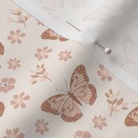 small monarch butterflies in boho muted pink