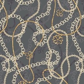 Golden Chains with pendants on a grey background