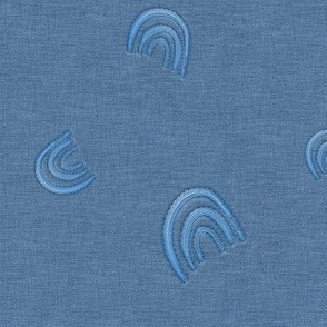 Blue Embroidered Rainbows Stitched on Denim Canvas Background