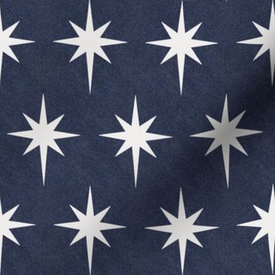 White star of Bethlehem on indigo denim background