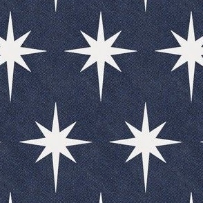 White star of Bethlehem on indigo denim background