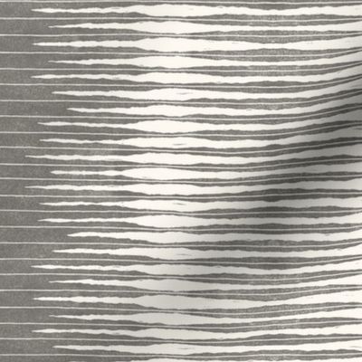 Small horizontal tone and texture organic variegated stripe in dark warm grey on off white ecru