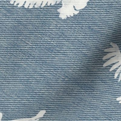 White coastal flying birds on denim background