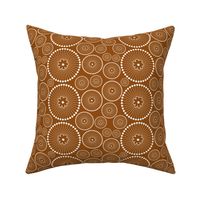 Sea floral circle ornament in white on copper brown background