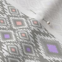 Geometric ethnic ikat pattern. Gray, lilac, coral diamonds on a white background.
