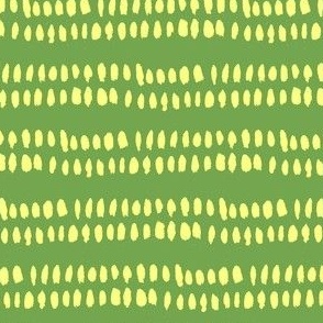 Yellow grass stripe on green 