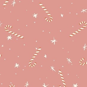 Hand drawn tossed festive christmas candy canes and stars in dusty pink