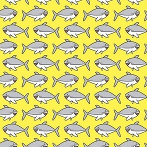 Sharks on bright yellow