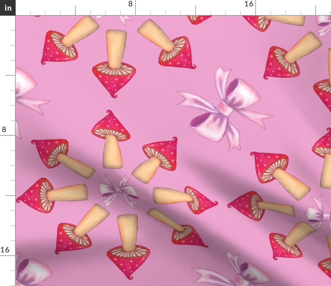 Red mushrooms and pink bows on pink background