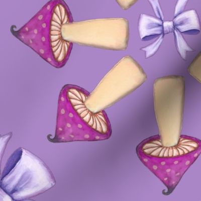 Purple mushrooms and bows on grape background