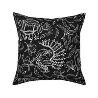 Large scale elephant, peacock and magnolia modern classic Indian Floral  in white on black ground. 