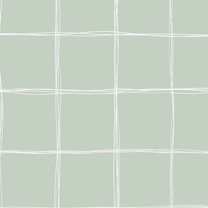 wobbly grid on almond green background