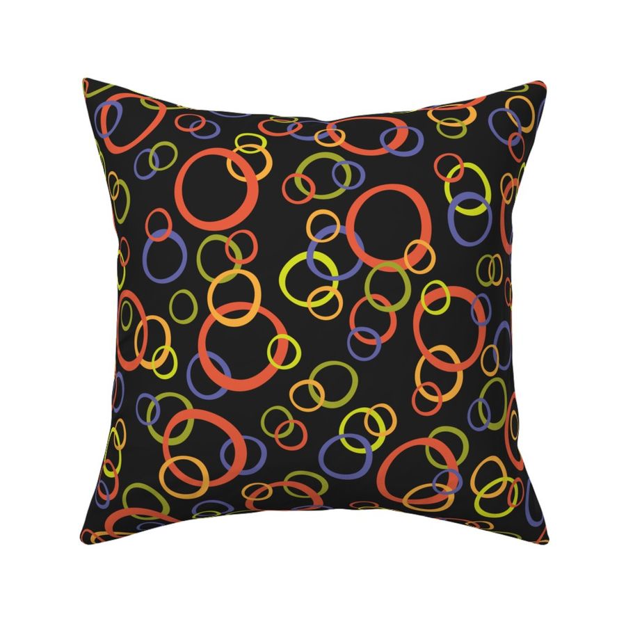 Festive Party Rings Tossed in Orange, Lime, and Periwinkle on Black