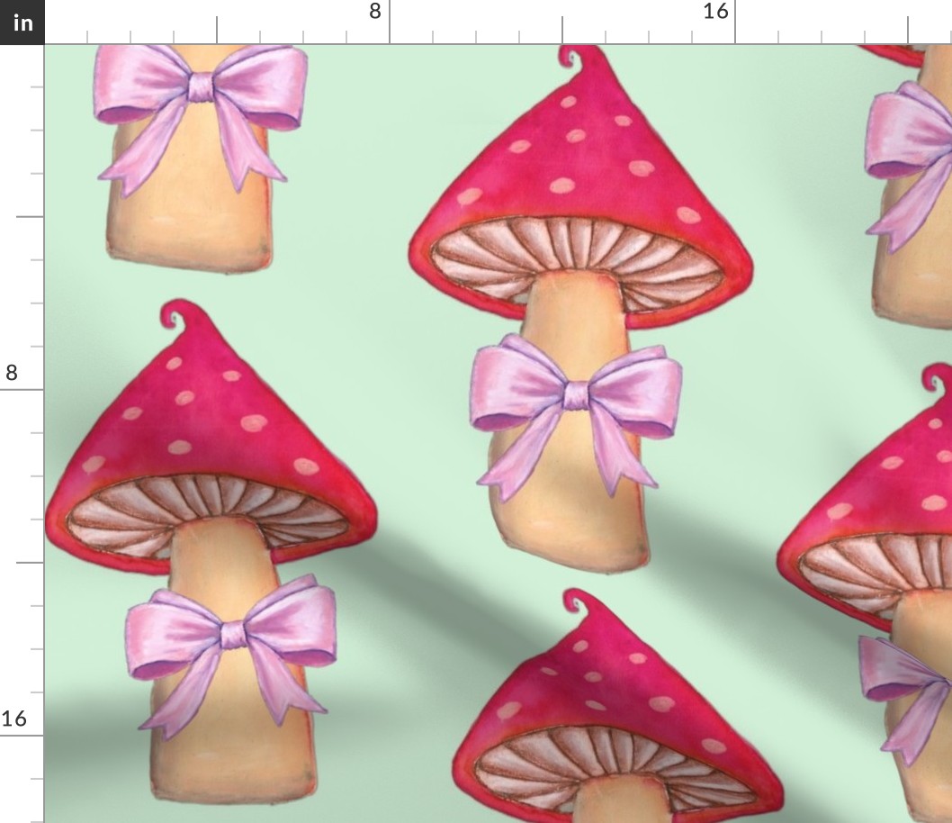 Red mushroom with pink bows on mint green background