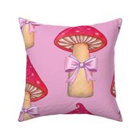 Red mushroom with pink bow 