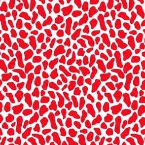 Small wild animal print, two color, fire red on white ground.