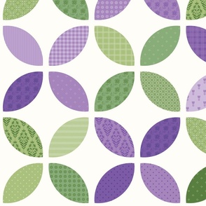 Orange Peel Mock Applique Cheater Quilt in shades of Green Lavender and Purple.