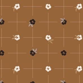 Delicate grid with bold small flowers polka dot style - white and black on copper brown background