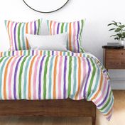 Bright watercolor vertical stripe perfect for kids playroom wallpaper