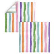 Bright watercolor vertical stripe perfect for kids playroom wallpaper